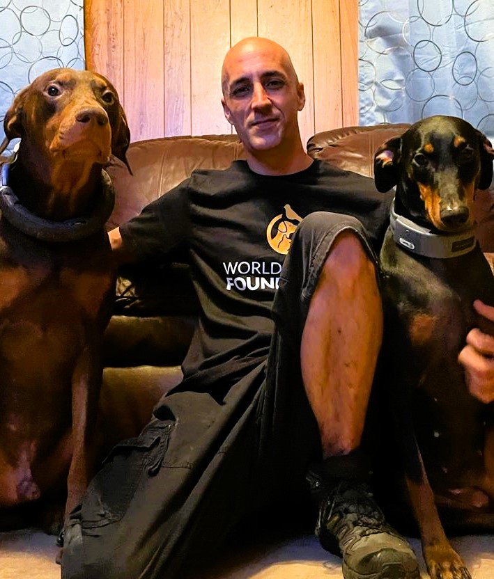 thomas with his dogs ares and athena